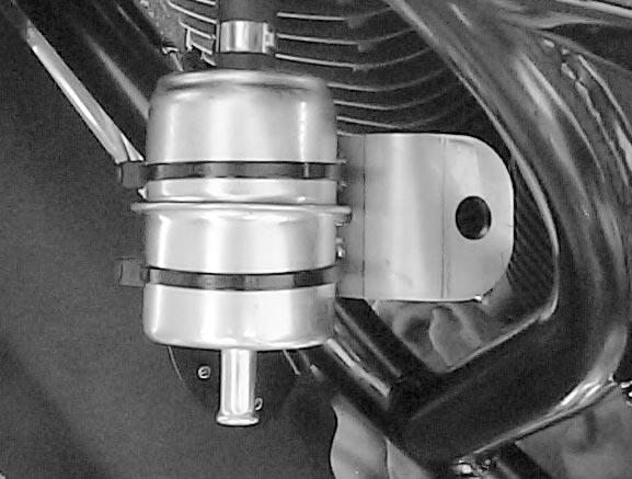 The fitting should point toward the rear of the motorcycle (opposite of the way shown). Figure 1. Fuel Outlet Fitting Be sure to push the fuel line all the way onto the fuel rail connection.