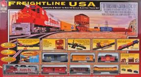 Festive freight train includes Santa Fe diesel with working headlight, three holiday-themed cars and matching caboose.