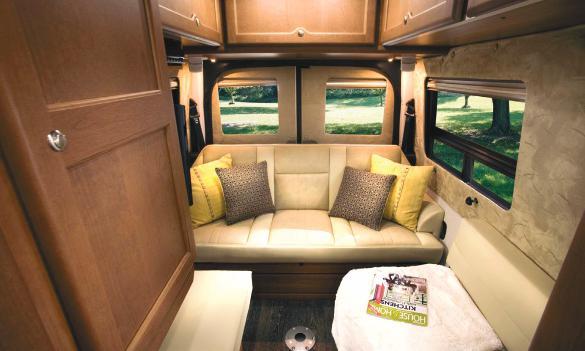 This lavish RV boasts sleek styling, in-floor heating, an expanded kitchen with high-end finishes