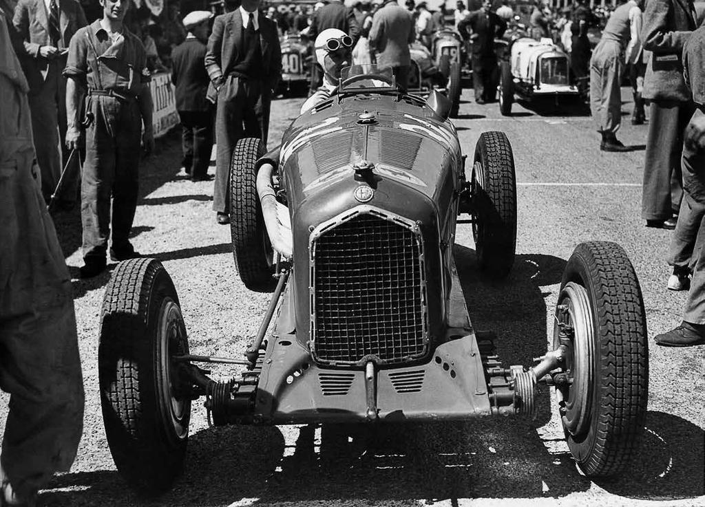 INTRODUCTION René Dreyfus at the wheel of his Alfa Romeo Monoposto on the starting grid for the 1935 Dieppe Grand Prix.