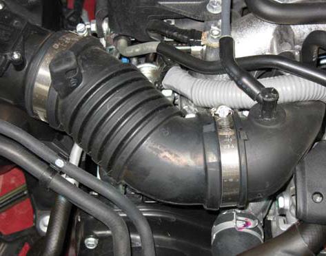 2. Removal of stock system a. Stock air box system installed. b. Unplug the mass air flow sensor (MAF) wiring harness. c.