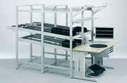 Worktables and flow-through shelving F.