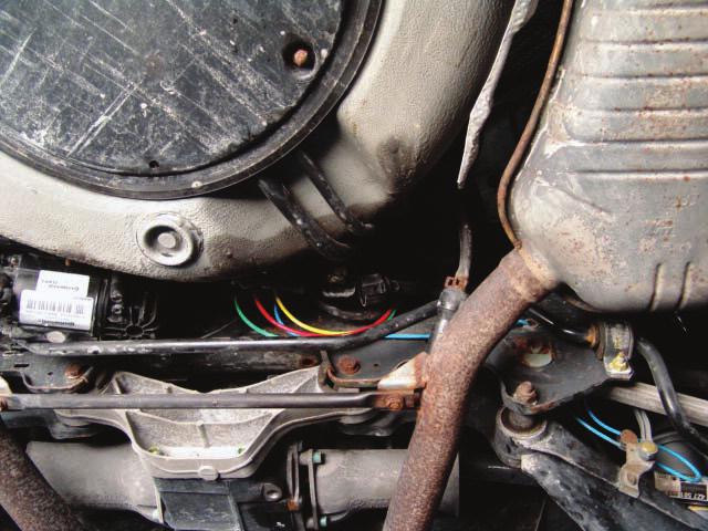 Disconnect the three (3) electrical plugs, air line and intake air hose from the