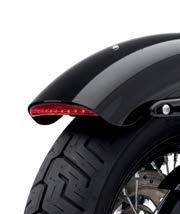 The low-profile lamp is contoured to hug the curve of the chopped rear fender, and adds a stylish touch of color, even when the bike is parked. 73416-11 Red Lens. $89.95 Fits 10-later FXDWG models.