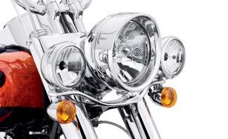LIGHTING 651 Headlamps Auxiliary c. Deluxe Auxiliary Lighting Kit FL Softail Models Shaped by the wind.
