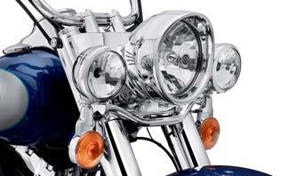 $394.95 c. Deluxe Auxiliary Lighting Kit FL Softail Models (shown with Auxiliary lamp bulb kit) d. Auxiliary Lighting Kit FL Softail Models Function and style in one.
