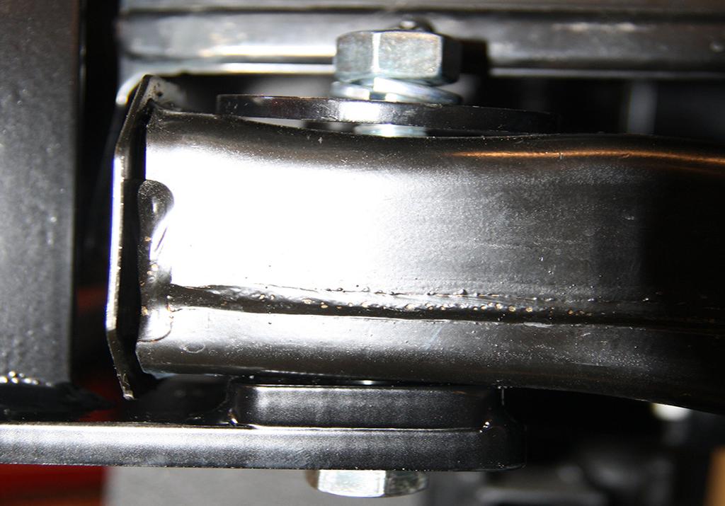 Note: the two-way locknuts have a dimple on the side and are self-locking. Note: ensure that wiring looms are not being pinched between the bracket and frame. Fig.T 15.