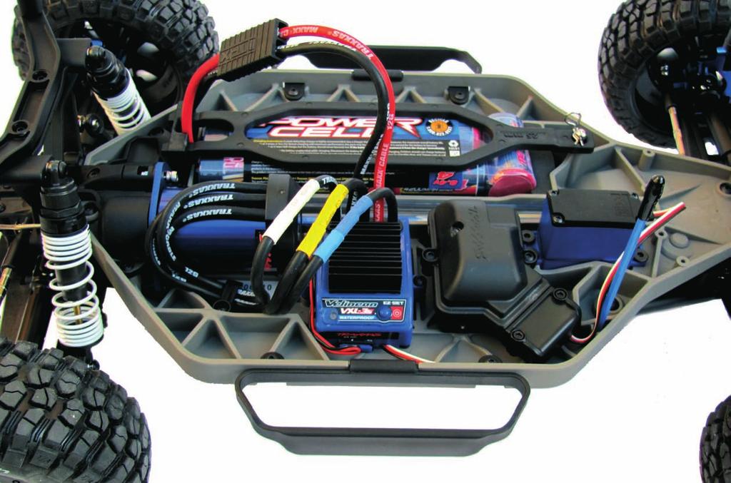 RTR REVIEW Above: Waterproof VXL Brushless and 2.4 GHz radio is fitted as standard equipment slotting in a 3S LiPo pack and gently feeding in the power.