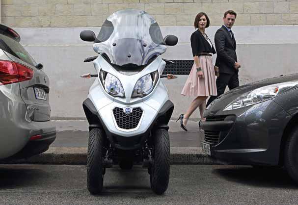 MORE TECHNOLOGY Parking problems are forgotten with the Piaggio MP3 500, whose electronic roll-lock system enables you to park the scooter anywhere*, without having to use