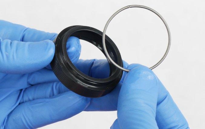 from each new dust wiper seal and set them