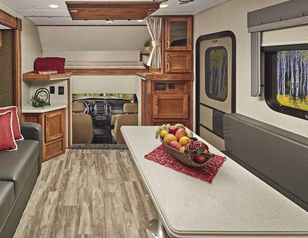 Veracruz 35FWC Shown in Iced Latte Decor. The adventurous spirit of the Veracruz features a comfortable and stylish design including a slide a bed sofa that converts to a queen bed.
