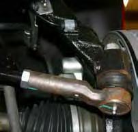 Note: Be sure to mark the OEM torsion bars driver & passenger side for reinstallation. 7. Remove the OEM front sway bar end links using a 15mm socket. Photo # 4 8.