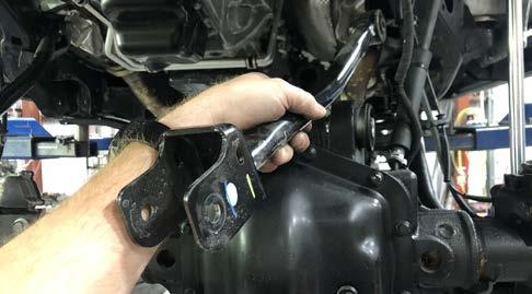 Install the new upper control arm making sure that the grease