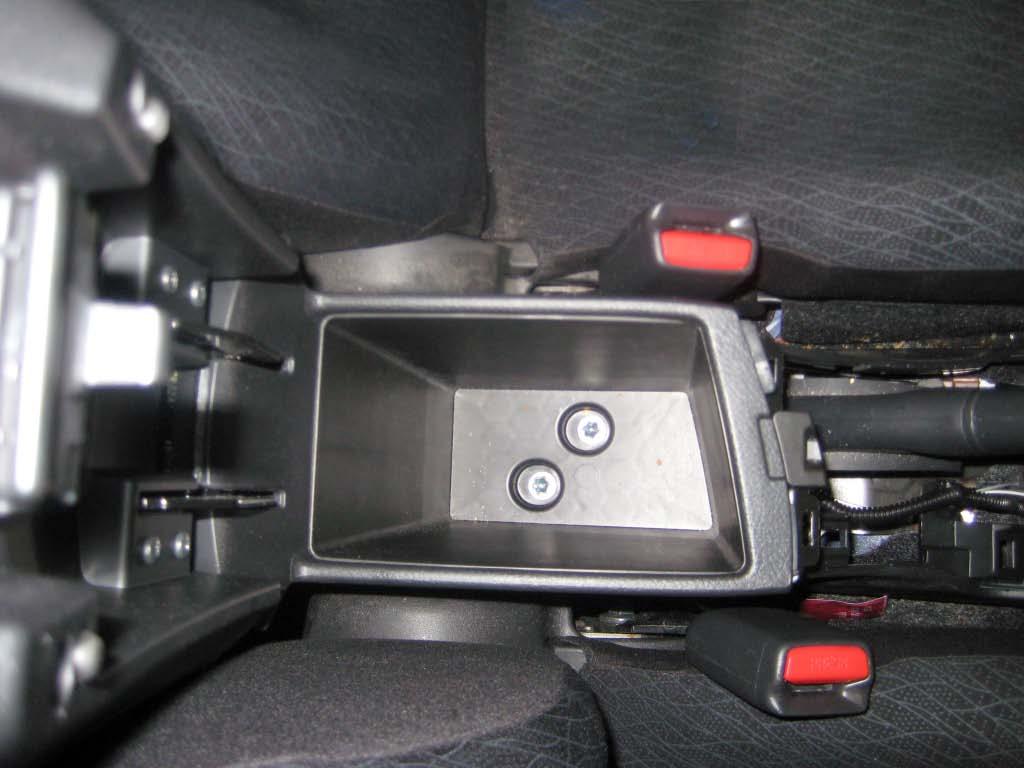 (Fig. 1-13). 3. Apply protective tape to the top of the rear center console.