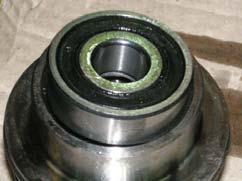 b) Wet with alcohol the seal seat and the O-ring, fit the fixed section of the seal into the seat on the motor connection flange, using a soft tool (A = NYLON I PTFE), with a