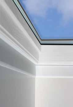 Features pre-finished white wood frame and protective aluminum or copper cladding. Integrated gaskets drain condensation to the outside. Streamlined exterior profile does not obstruct your roofline.