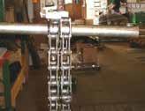 Be careful not to damage threads. (See picture 1) 3. Suspend a pipe between 2 ladders and hang chains over pipe as shown in photo at lower right hand corner.