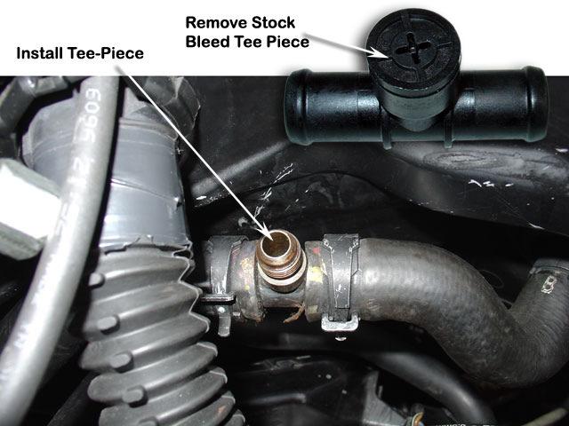 15 Remove the stock coolant bleed tee-piece from the heater hose located near the RHS