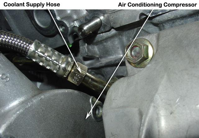29 Install the stainless steel braided coolant supply hose (Item 196) with the 45