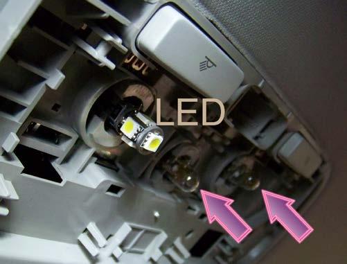 Pull the original filament bulbs (arrows) and install three new 5-chip LEDs. The LEDs are polarity sensitive.
