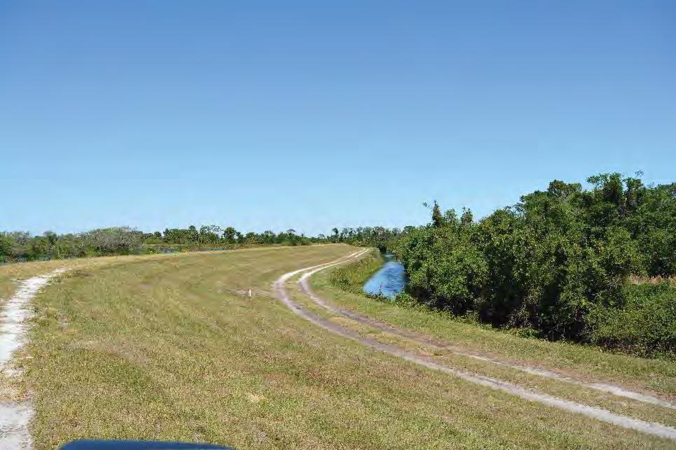 AAI File No. 18-1621 2018 Capron Trail Reservoir Inspection Report Page-8 OUTER SLOPES A ditch has been excavated to a depth of about one foot along all toes of the reservoir.