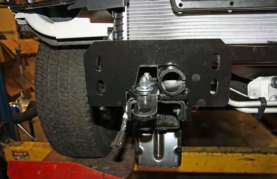 On each side, bolt up through the frame and the main receiver brace using the supplied ½" x 2" bolts and ½" flat washers.