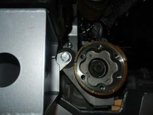 32. Install rear differential mount using 9/16 x 4 bolt, flat washers, and