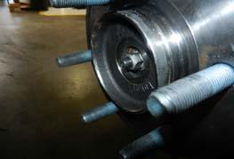 Once the splines have been engaged, install factory axle nut. Torque to 18 ftlbs.