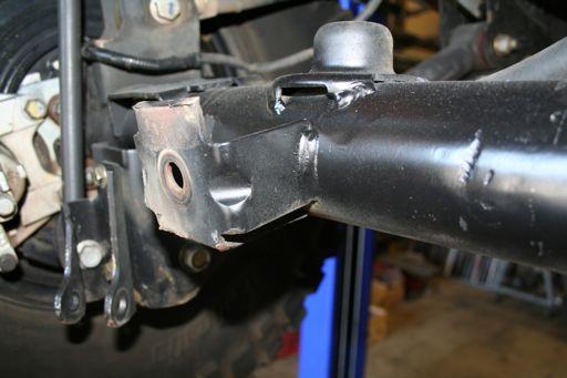 Install the u-bolts over the axle tube and through the