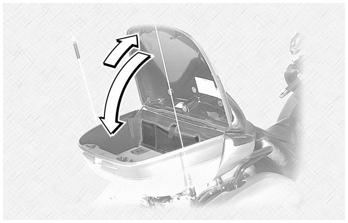INSTRUMENT AND CONTROL FUNCTIONS CAUTION: ECA10910 Do not apply excessive pressure on the travel trunk lid when it is open. To close the travel trunk 1.