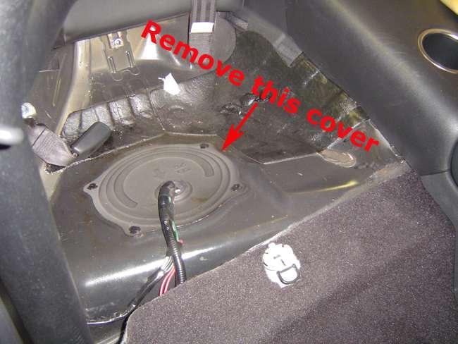 1. Begin by removing the passenger side portion of the rear seat. This is done by pulling on the lever under the frontcenter of it and then pulling the seat up and forward. 2.