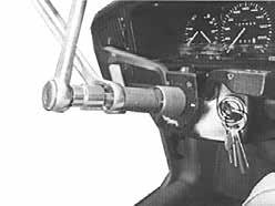 For correct removal of the driver-side airbag it is necessary to release the retaining bracket from its anchor with the appropriate wrench.