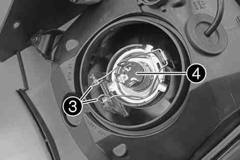 Attach the connector. Install the headlight mask with the headlight. ( p. 118) 9.64Changing the parking light bulb Note Damage to reflector Keep the glass of the bulb free of grease.