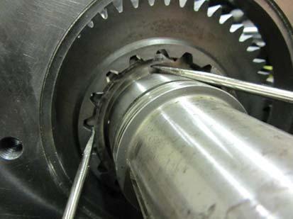 Install the snap ring that retains the Input Shaft to the main drive gear 7.