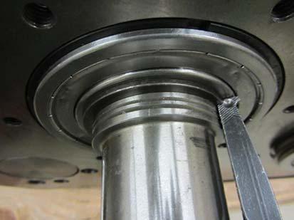Using a flanged-end bearing driver install the Input Shaft bearing into the transmission main case until the snap ring groove is fully visible. 8.