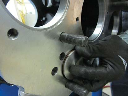 Remove the Oil Pump Cover from the front of the transmission main case. 11.