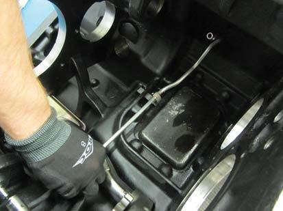 Install the Main Feed Tube into the transmission main case.