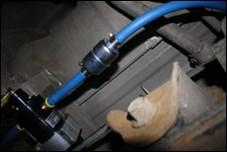 Install in-line fuel filter in an accessible location in the suction line using the