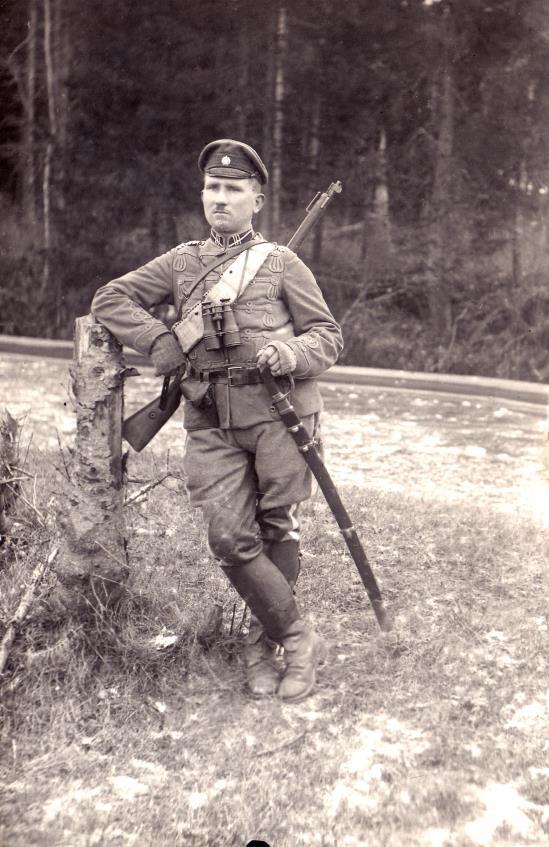 Sergeant of the Courland separate squadron Kārlis Rebiņš. Weapons 1908 type german carabine Kar,98 and russian 1881 type dragoon sword shashka. November 1919.