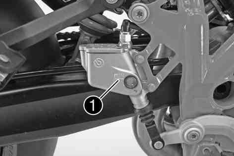 BRAKES 100 11.9Checking the rear brake fluid level Warning Danger of accidents Failure of the brake system. Check the brake disc for damage, cracking and deformation.