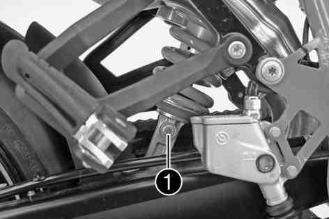 TUNING THE CHASSIS 77 101121-10 Turn adjusting screw clockwise up to the last perceptible click. Turn back counterclockwise by the number of clicks corresponding to the shock absorber type.