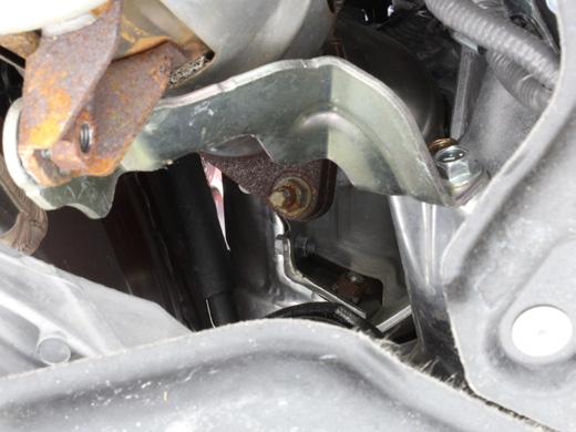 7 Assembly Guide 07. From under the vehicle, remove the last two nut from the downpipes, one from each side.
