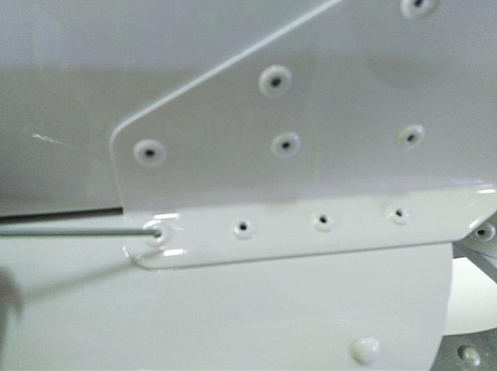 3.8) Drill out 4 rivets on the left side and 4 rivets