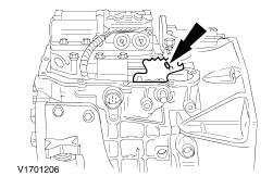 5. Loosen the nut on the ball stud for the manual valve detent lever actuating rod assembly. 6. Remove the manual control lever bolt.. Using the special tool and pin, align the shifter shaft. 8.