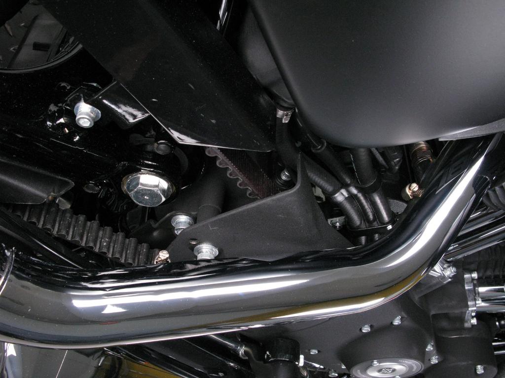 Align the heat shields in respect to the header tubes and tighten the tape clamps