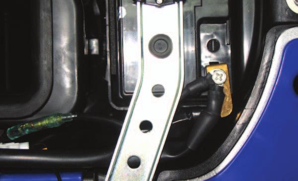 12 Mount the PCV in the pocket of the rear fender on the left side using the supplied Velcro.