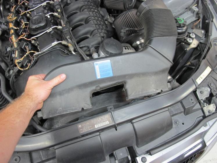 1. Start by removing stock air box and inlet feeding from above front