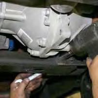 (See Photo # 8) 11. Disconnect the OEM steering shaft & all electrical connections from the OEM rack & pinion.