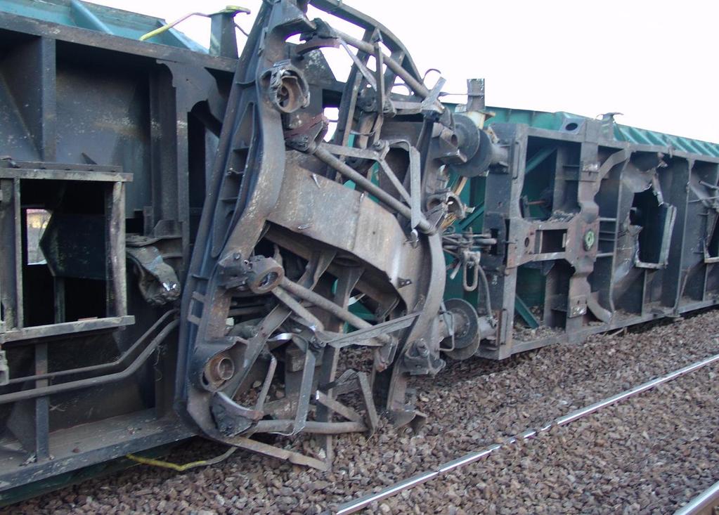Figure 13: The hopper openings of the toppled wagons without the hopper covers Undoubtedly, the cause of the derailment was the fact that the train ran through the fallen hopper cover as a result of