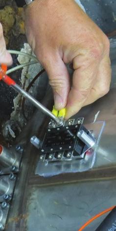 Cut one wire of each heating element to a length that can reach posts on the left side of